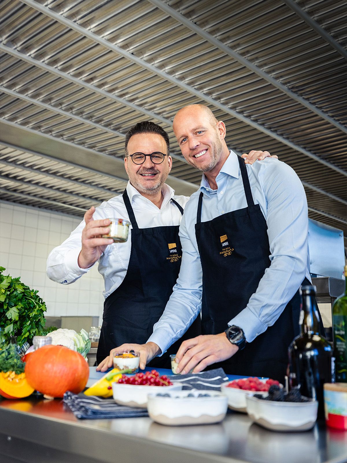 Jens and Peter Sander in the Sander Group’s production kitchen.